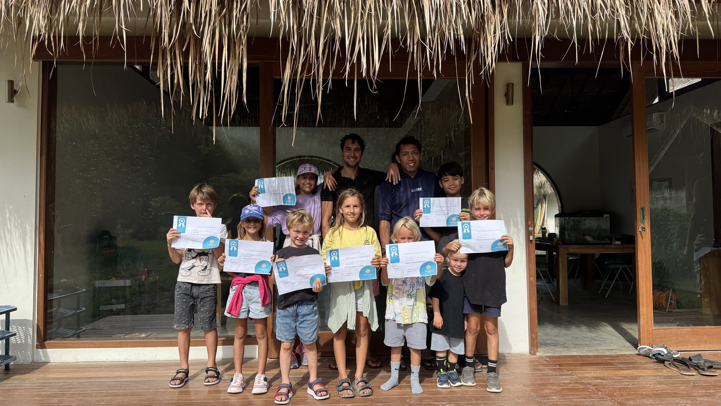 Students receiving certificates of achievement at Selong Bay School